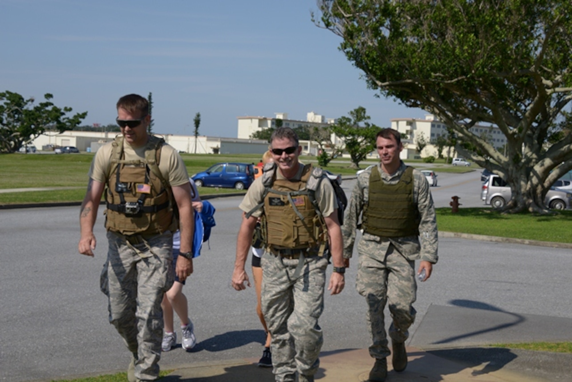 From left, Chief Master Sgt.Mark Peters and Chief Master Sgt. Greg Jones, 353rd Special Operations Group along with Master Sgt. Jeremy Tygrett, 1st Special Operations Squadron, participate in the 353rd Special Operations Group Top Three 6-mile ruck march April 26 here on Kadena.  SOG
personnel and their family members attended the event that raised more than
$450 for the Air Force Assistance Fund.  AFAF was established as an annual effort to
raise funds for organizations such as Air Force Villages Inc., Air Force Aid
Society, Inc., General and Mrs. Curtis E. LeMay Foundation and the Air Force
Enlisted Village, Inc.  (U.S. Air Force photo by Tech. Sgt. Kristine Dreyer/Released)  

