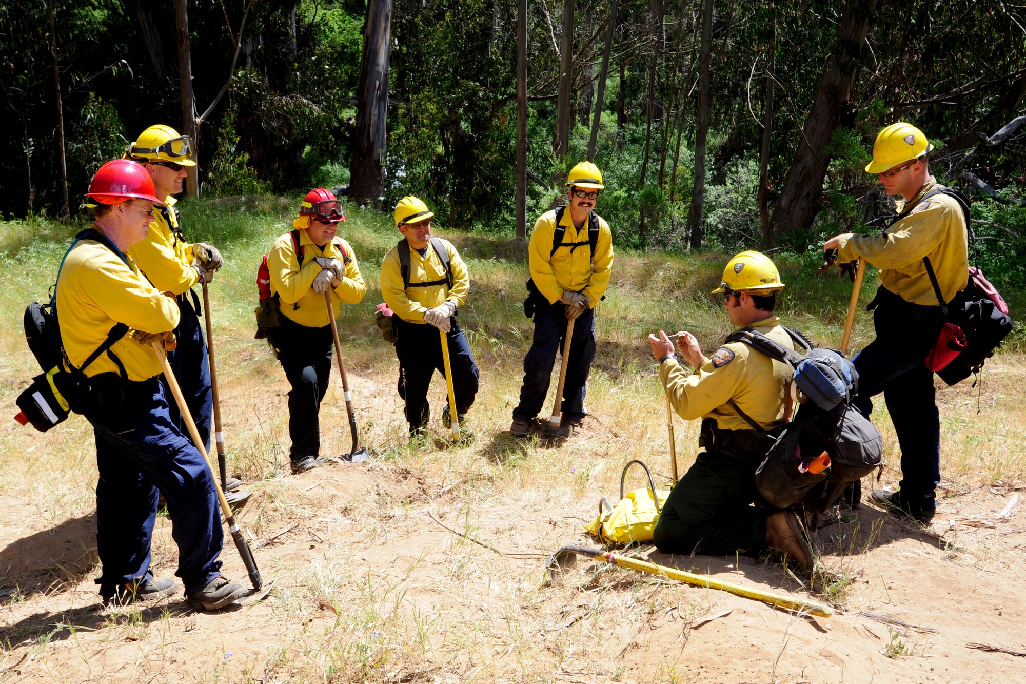 VANDENBERG AIR FORCE BASE, Calif. – Nathan Ogan, 30th Civil Engineer Squadron Hot Shots instructor, provides training on using a backpack pump here Tuesday, April 30, 2013. The firefighters were participating in Vandenberg’s Annual Wildland Fire Academy, which is designed to keep Team V’s firefighters mission ready. (U.S. Air Force photo/Airman Yvonne Morales)