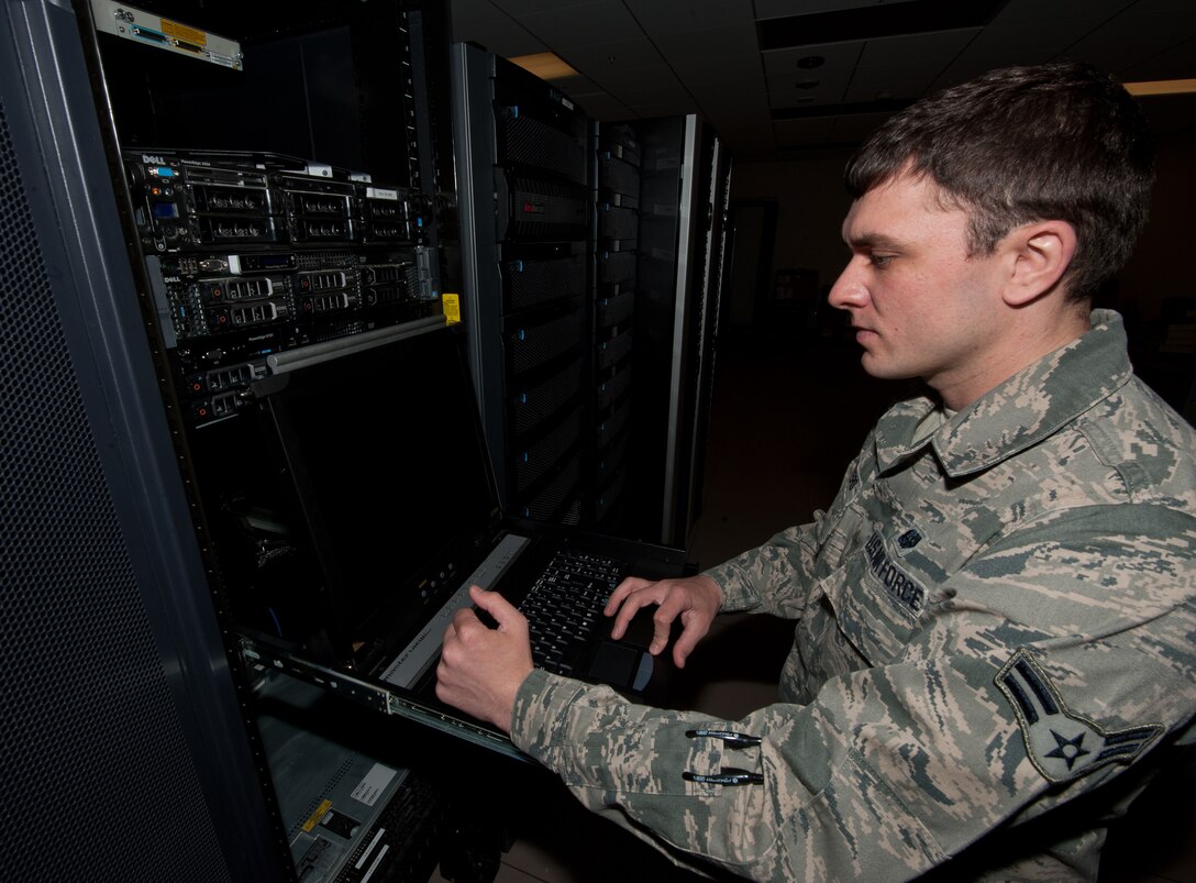 Airman 1st Class Joshua Peters, 28th Communications Squadron cyber systems operator, connects to the unit level command server at Ellsworth Air Force Base, S.D., April 25, 2013. From this server, Peters can unlock accounts, perform updates, and modify files to help members of Ellsworth perform their duties. (U.S. Air Force photo by Airman 1st Class Alystria Maurer/Released)