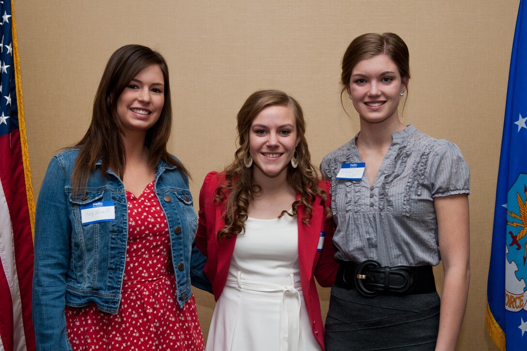 (From left) Mary Edwards, Alexandria Ostler and Ellen Voigt, family members of Ellsworth Airmen, were among five individuals who received scholarships from the Ellsworth Officers' and Civilians' Spouses Club during a luncheon at the Dakota’s Club on Ellsworth Air Force Base, S.D., April 25, 2013. The OCSC provided five academic scholarships totaling $9,500 for use during the 2013 – 2014 school year. (U.S. Air Force photo by Airman 1st Class Kate Thornton-Maurer/Released) 