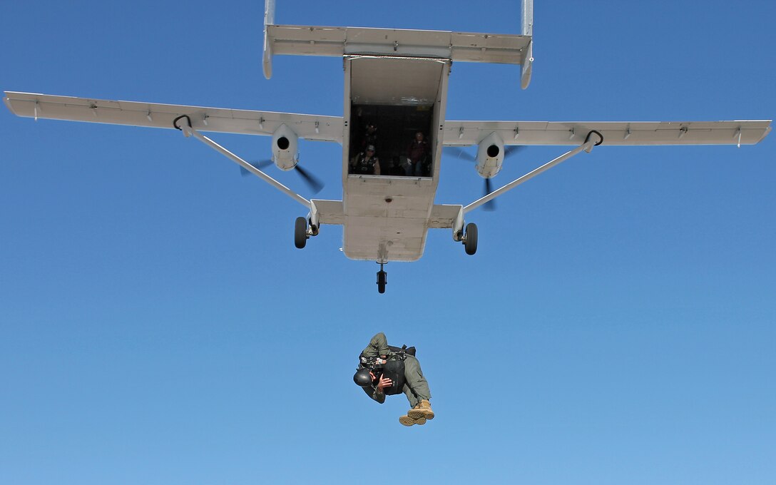 Tech. Sgt. Matthew Mensch, 418th FLTS parachute test jumper, exits a SC.7 Skyvan with a Low Profile parachute April 12, 2013 over the Edwards Farm Dropzone. The Low Profile Parachute is intended to replace the BA-22 parachute which is currently configured for use in the AC-130 gunship. (U.S. Air Force photo by Staff Sgt. Jonathan Case)