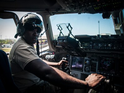 Army Wives actor Joshua Henry sits in the cockpit of a C-17 Globemaster III during a tour of the aircraft April 26, 2013, at Joint Base Charleston –Air Base, S.C. Army Wives tells the story of four women and one man who are brought together by their common bond - they all have military spouses. The series is based on the book "Under the Sabers: The Unwritten Code of Army Wives" by Tanya Biank and is produced by ABC Television Studio and The Mark Gordon Company. (U.S. Air Force photo/Senior Airman Dennis Sloan)