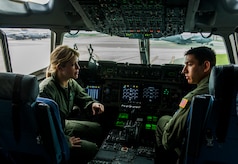 First Lieutenant Leonard Trujillo, 14th Airlift Squadron pilot, explains the various C-17 Globemaster III cockpit systems controls to Sara Haines, NBC TODAY Show correspondent, during a visit April 19, 2013, at Joint Base Charleston – Air Base, S.C. Haines met with members from the 437th Aircraft Maintenance Squadron, 14th Airlift Squadron, 628th Security Forces Squadron Ravens team and 437th Aerial Port Squadron for a segment for the TODAY show. Each interview included hands-on interaction with Airmen who explained their jobs and their roles in achieving the Air Force mission. (U.S. Air Force photo/ Senior Airman George Goslin)