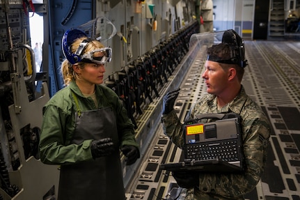 Senior Airman Jay O'Neil, 437th Aircraft Maintenance Squadron crew chief, explains the internal functions of a C-17 Globemaster III to Sara Haines, NBC TODAY Show correspondent, while taping during a visit April 19, 2013, at Joint Base Charleston – Air Base, S.C. Haines met with members from the 437th Aircraft Maintenance Squadron, 14th Airlift Squadron, 628th Security Forces Squadron Ravens team and 437th Aerial Port Squadron for a segment for the TODAY show. Each interview included hands-on interaction with Airmen who explained their jobs and their roles in achieving the Air Force mission.  (U.S. Air Force photo/ Senior Airman George Goslin)