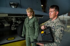 Sara Haines, NBC TODAY Show correspondent, and Senior Airman Jay O’Neil , 437th Aircraft Maintenance Squadron crew chief, prepare to begin taping during a visit April 19, 2013, at Joint Base Charleston – Air Base, S.C. Haines met with members from the 437th Aircraft Maintenance Squadron, 14th Airlift Squadron, 628th Security Forces Squadron Ravens team and 437th Aerial Port Squadron for a segment for the TODAY show. Each interview included hands-on interaction with Airmen who explained their jobs and their roles in achieving the Air Force mission.  (U.S. Air Force photo/ Senior Airman George Goslin)