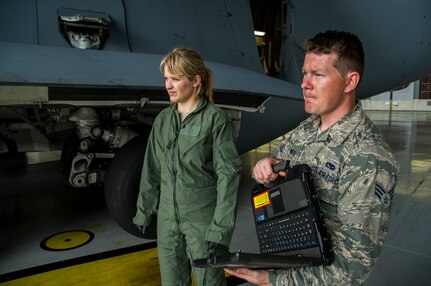 Sara Haines, NBC TODAY Show correspondent, and Senior Airman Jay O’Neil , 437th Aircraft Maintenance Squadron crew chief, prepare to begin taping during a visit April 19, 2013, at Joint Base Charleston – Air Base, S.C. Haines met with members from the 437th Aircraft Maintenance Squadron, 14th Airlift Squadron, 628th Security Forces Squadron Ravens team and 437th Aerial Port Squadron for a segment for the TODAY show. Each interview included hands-on interaction with Airmen who explained their jobs and their roles in achieving the Air Force mission.  (U.S. Air Force photo/ Senior Airman George Goslin)