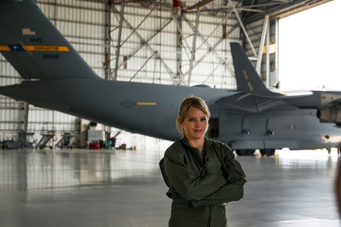 Sara Haines, NBC TODAY Show correspondent, dons a flight suit as she prepares to interview Airmen during a visit April 19, 2013, at Joint Base Charleston – Air Base, S.C. Haines met with members from the 437th Aircraft Maintenance Squadron, 14th Airlift Squadron, 628th Security Forces Squadron Ravens team and 437th Aerial Port Squadron for an upcoming segment of the TODAY show. Each interview included hands-on interaction with Airmen who explained their jobs and their roles in achieving the Air Force mission.  (U.S. Air Force photo/ Senior Airman George Goslin)