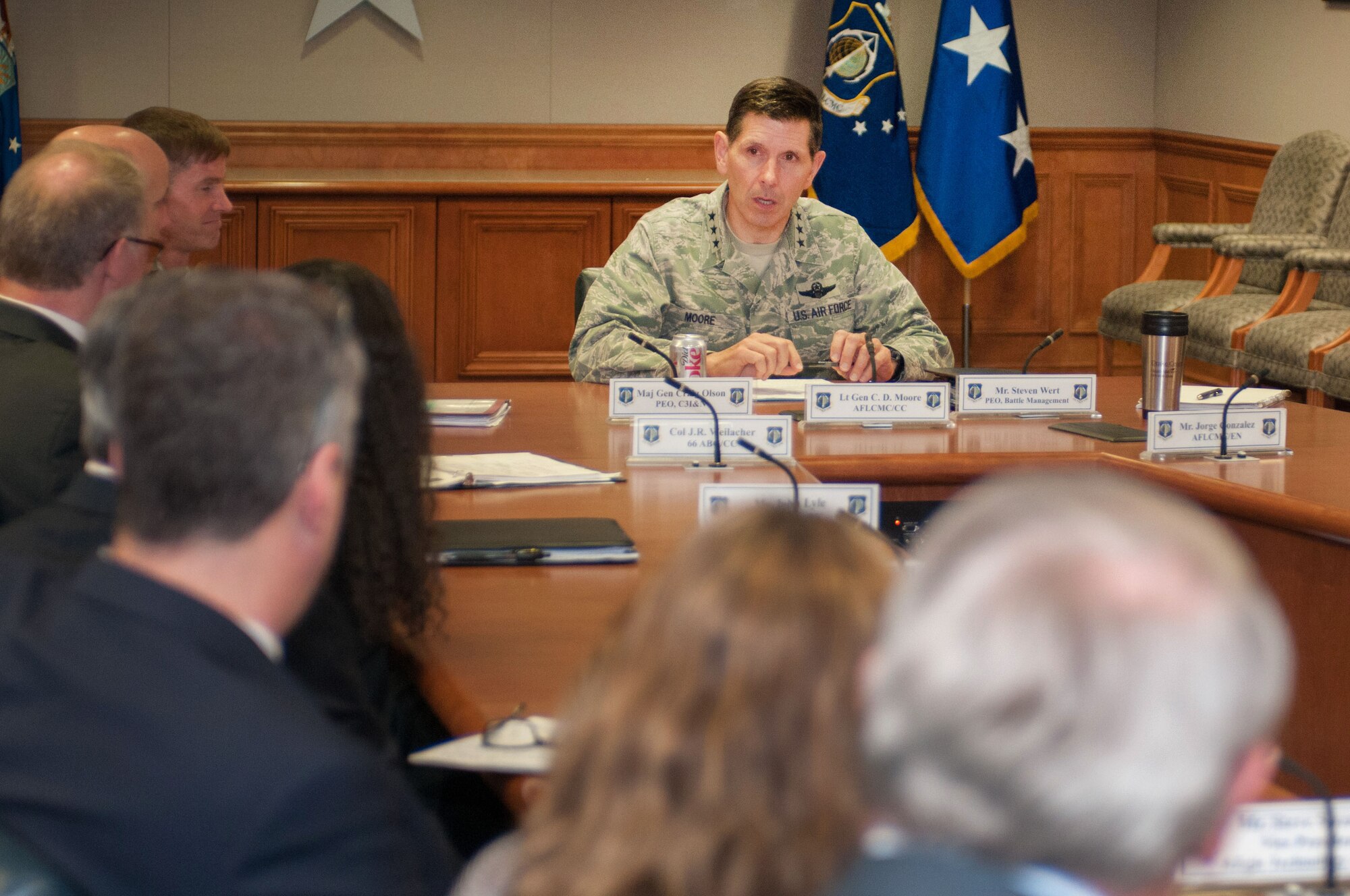 HANSCOM AIR FORCE BASE, Mass. -- Lt. Gen. C.D. Moore Commander, Air Force Life Cycle Management Center, takes part in the Hanscom Small Business Roundtable Discussion with members of local small business April 24.  Business member discussed the current fiscal state. (U.S. Air Force photo by Rick Berry)