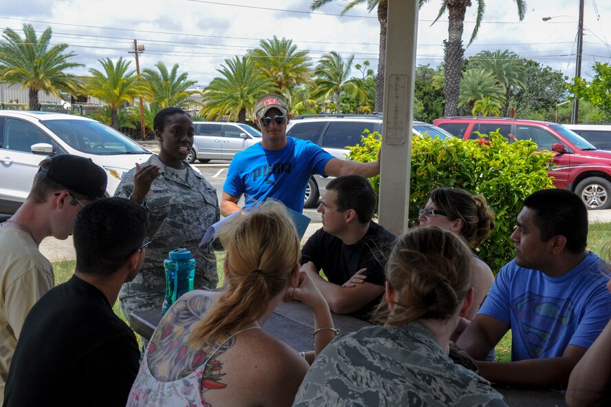Staff Sgt. Tamia Griffie, 15th Medical Operations Squadron mental health technician, discusses interpersonal communication with junior airmen from the 15th Wing Staff Agencies during the monthly Airmen Mentoring session at Hickam Harbor on Joint Base Pearl Harbor-Hickam, Hawaii, April 29, 2013. The mentoring session, hosted by Staff Sgt. Thomas Hazlewood, was geared toward teaching young airmen the importance of knowing various types of human personalities and how to tailor leadership styles to meet the needs of future subordinates and co-workers. The Airmen Mentoring program is a part of a new initiative by the 15th WG command chief to actively provide WSA Airmen professional development. (U.S. Air Force photo/Staff Sgt. Terri Paden)