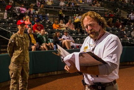 Ken Carrington, Charleston RiverDogs announcer, pays tribute to the military personnel during the Charleston RiverDogs Military Appreciation Night game April 25, 2013, at the Joseph P. Riley, Jr. Park in Charleston, S.C. The Charleston RiverDogs hosted Military Appreciation night to show their support for the local military. (U.S. Air Force photo/ Senior Airman George Goslin)
