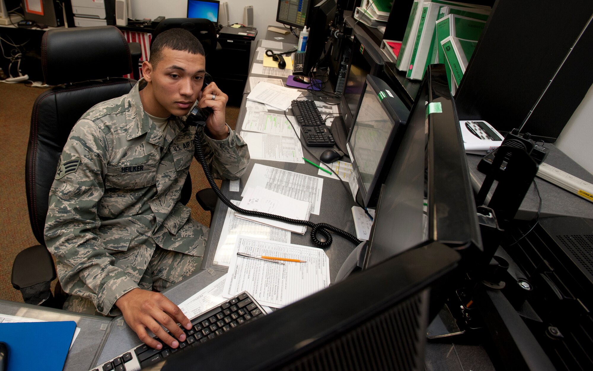 Senior Airman Tony Heilker, 22nd Air Refueling Wing Command Post emergency actions controller, coordinates the positioning of a KC-135 Stratotanker April 30, 2013, McConnell Air Force Base, Kan. Command post controllers receive more than 150 calls per shift from agencies across the base, ranging from aircraft maintainers to pilots in midflight. (U.S. Air Force photo/Airman 1st Class Victor J. Caputo)