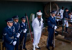 Members of the Joint Base Charleston Honor Guard wait for a rain delay to end during the Charleston RiverDogs Military Appreciation Night game April 25, 2013, at the Joseph P. Riley, Jr. Park in Charleston, S.C. The Charleston RiverDogs hosted Military Appreciation night to show their support for the local military. (U.S. Air Force photo/ Senior Airman George Goslin)