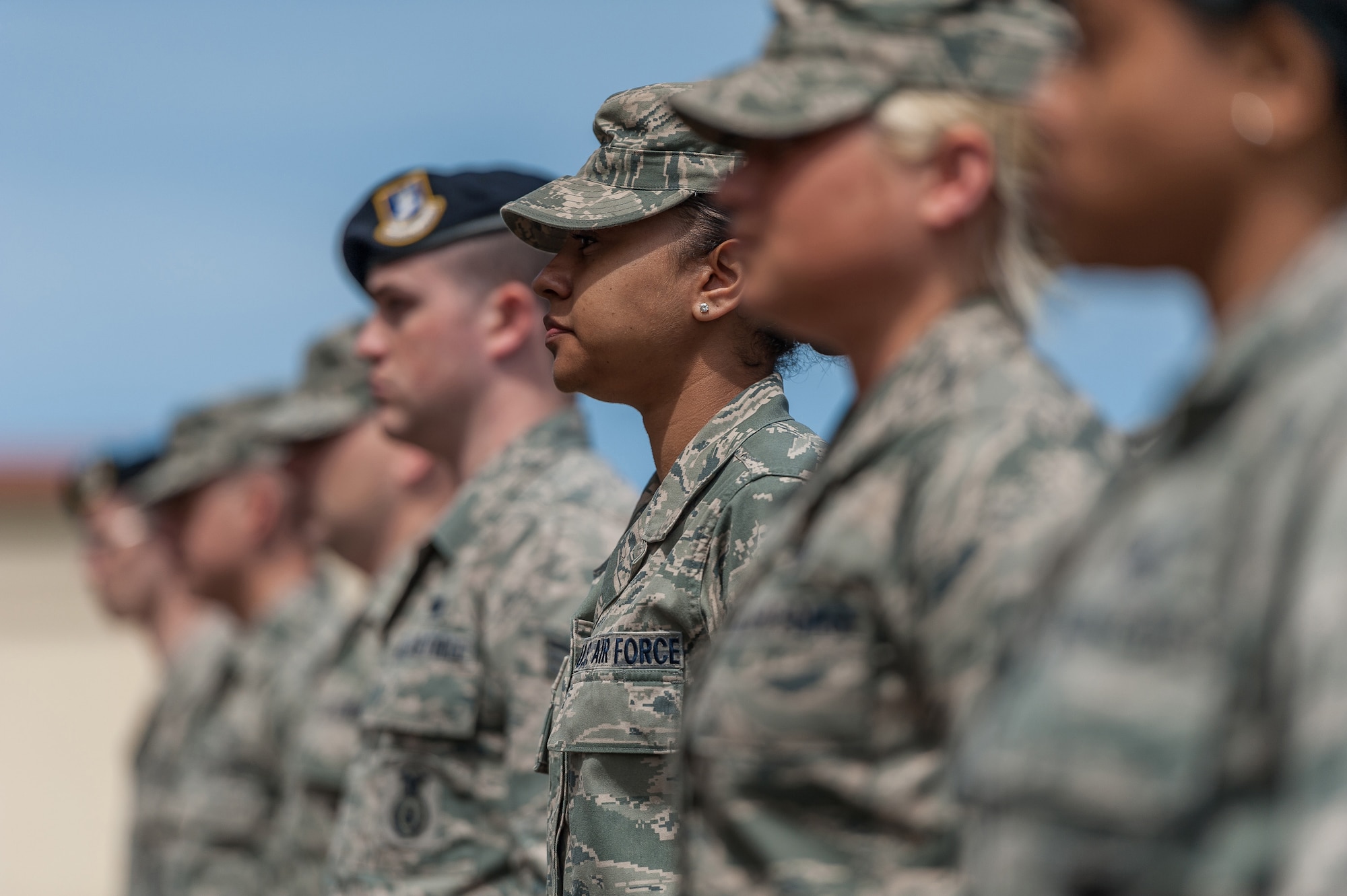Senior Airman Jacqueline Kennebrew, 65th Medical Operations Support Squadron emergency medical technician, along with her fellow students of Airman Leadership School class 13-B execute an 'open ranks' march during a formative drill evaluation, April 17, 2013, Lajes Field, Azores.  The students receive a refresher in military drill during their five week course.  (Photo by Lucas Silva/released)  