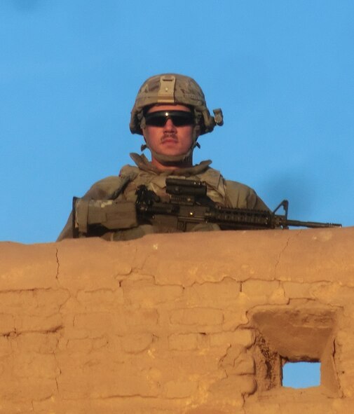 Tech. Sgt. Jason McCarty, 509th Civil Engineer Squadron structural craftsman, stands lookout on a wall while deployed to Afghanistan. McCarty was deployed from July 2012 through February 2013. (Courtesy Photo)