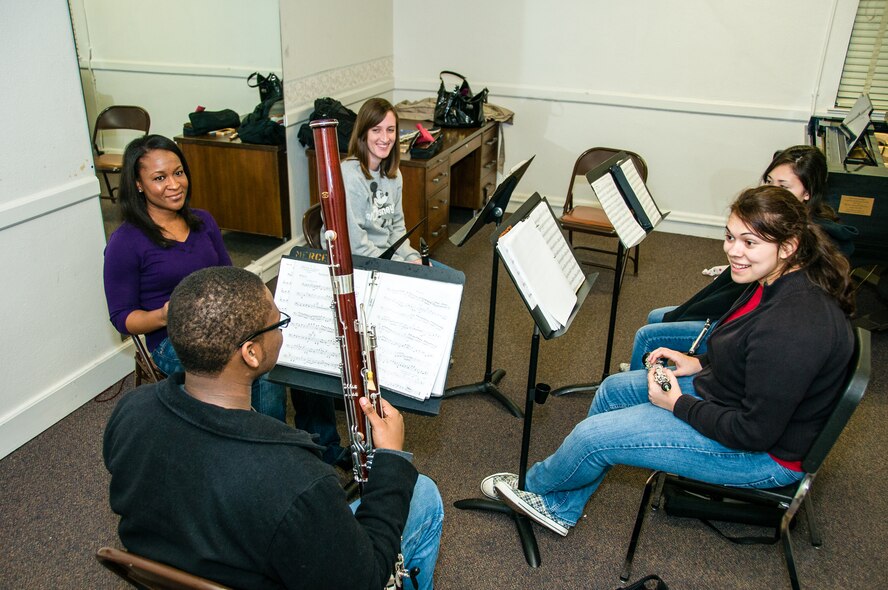 Staff Sgt. Sarah Carter, Band of the U.S. Air Force Reserve flutist, prepares for a Macon Symphony Youth Orchestra small group rehearsal Feb. 11, 2013, at Mercer University’s Newton Chapel. Macon Symphony Youth Orchestra is a musical organization that provides extensive rehearsal and performance opportunities to young musicians. MSYO is comprised of approximately 85 students, ages nine to eighteen, representing over thirty school s in Macon, Warner Robins, Perry, and the surrounding areas. (U.S. Air Force photo by Staff Sgt. Alexy Saltekoff)
