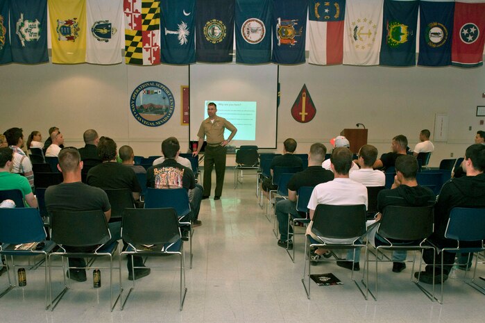 U.S. Marine Corps Lt. Col. Alex Waugh, officer in charge of Individual Ready Reserve Muster, talks to IRR Marines during the 2013 Muster April 27, 2013, at Nellis Air Force Base, Nev. The 2013 Las Vegas IRR Muster had 70 Marines attend in the morning and 115 for the afternoon session. (U.S. Air Force photo by Daniel Hughes)