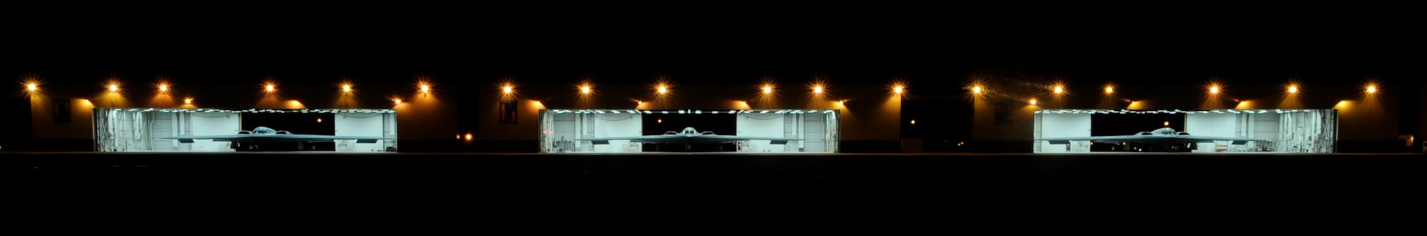 Three B-2 Spirit Bombers prepare for flight at Whiteman Air Force Base, Mo., April 25, 2013. Also known as the Stealth Bomber, the aircraft is a strategic bomber, featuring low-observable stealth technology designed for penetrating dense anti-aircraft defenses. The bomber has a crew of two and can drop up to eighty 500-pound joint direct attack munitions (JDAMS). The B-2 is the only aircraft that can carry large air-to-surface standoff weapons in a stealth configuration. (U.S. Air Force Photo by Staff Sgt. Alexandra M. Boutte/Released)