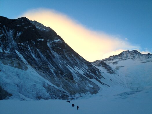 Early Morning Photo of Everest from Camp 2 Walking to Camp 1 (black pyramid on left). (Photo courtesy of USAF 7 Summits Team)