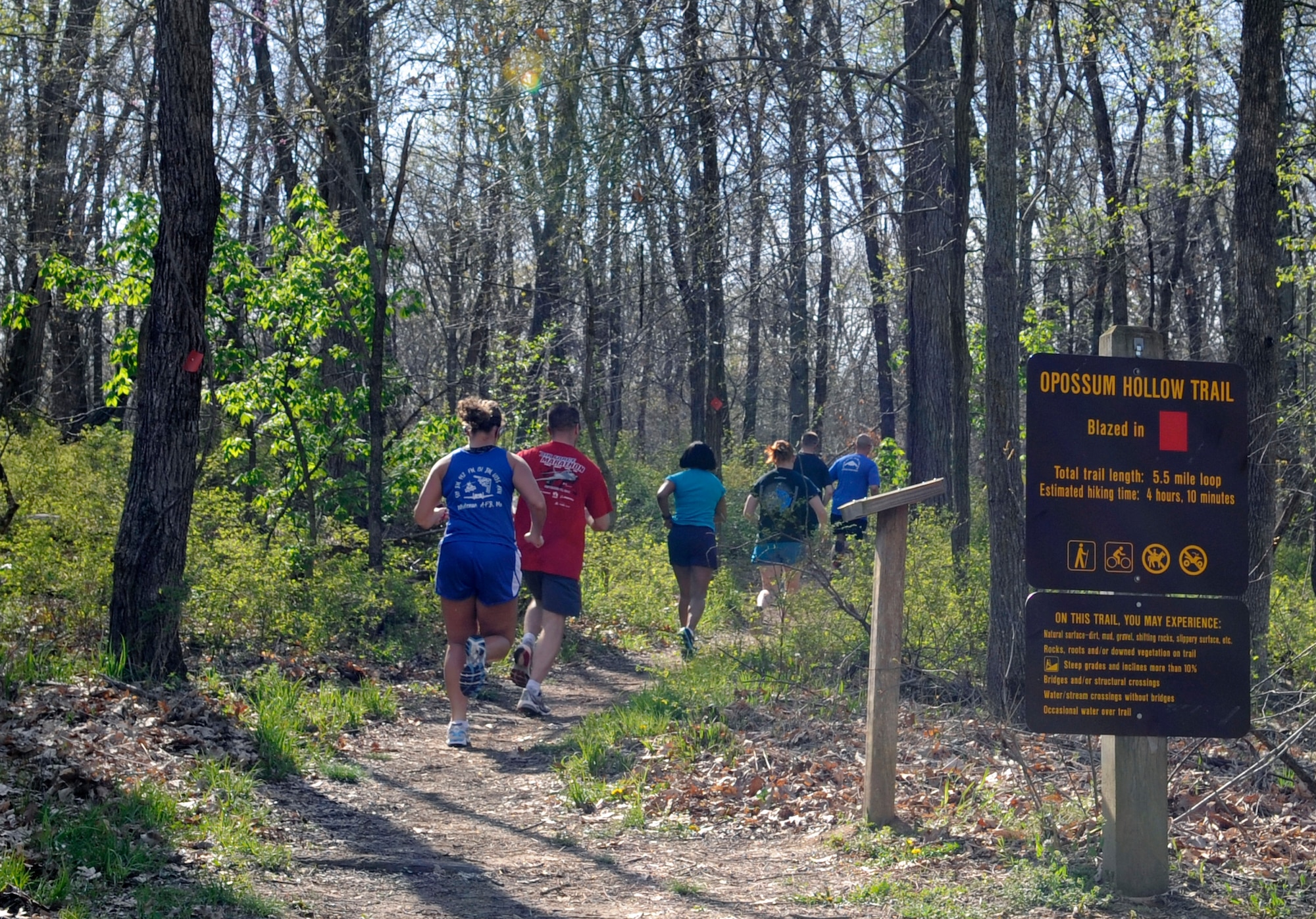 Members of Team Whiteman run a 10K in Knob Noster State Park, April 28, 2013, in preparation for the Air Force Marathon and Whiteman Striker Life Half Marathon. Airmen and their families will be able to run either the half marathon, 10K and or 5K.  Airmen can pre-register by visiting the website, www.onestoprace.com until May 10. All races begin at 8 a.m. May 11 at Ike Skelton Park. The 509th Force Support Squadron is asking for volunteers. Call Michael Taylor at 660-687-5493. (U.S. Air Force photo by Staff Sgt. Alexandra M. Boutte/Released)
