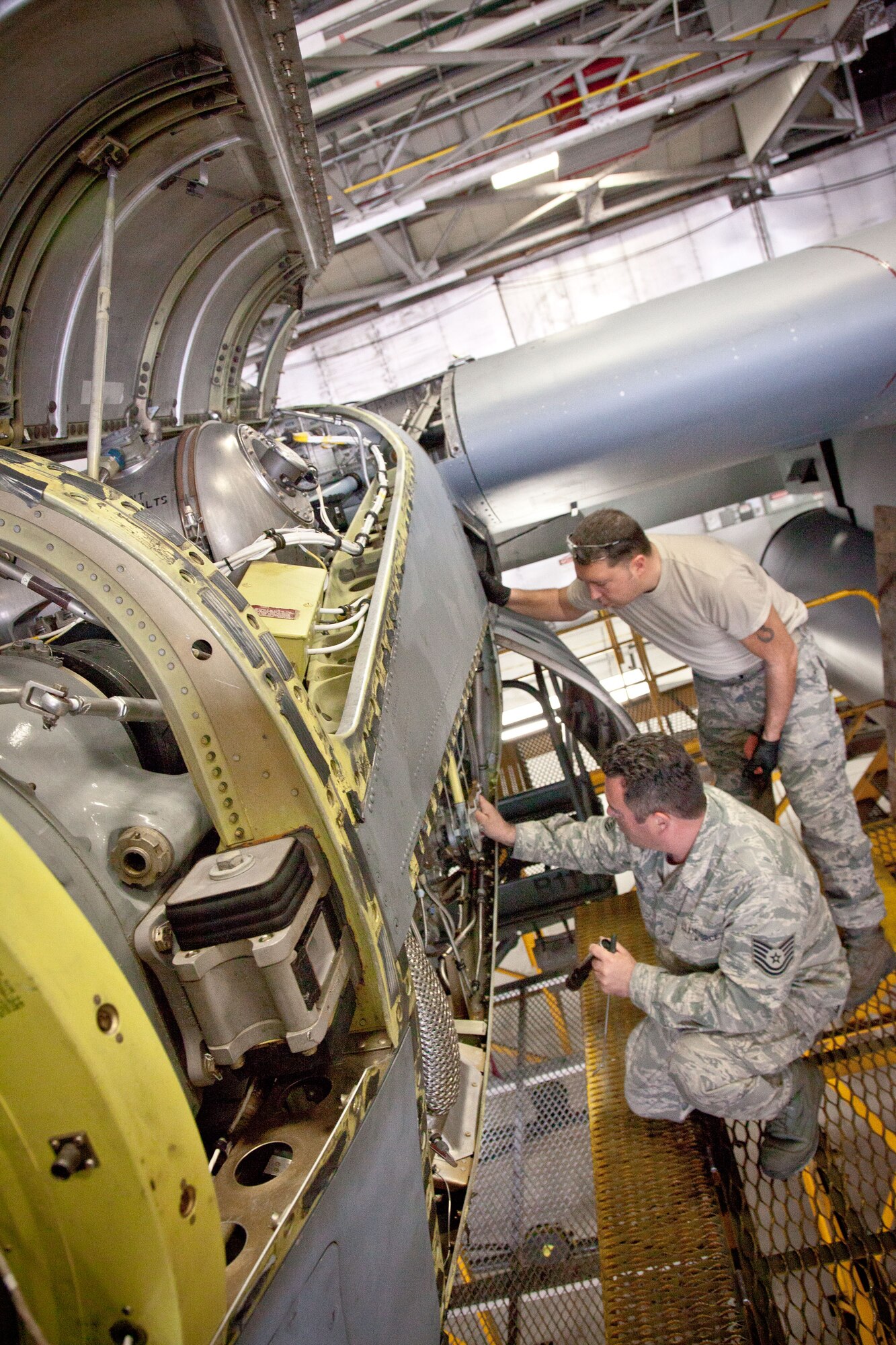 Tech. Sgt. Anthony Kanugh and Senior Airman Michael Veile, 934th Maintenance Squadron, complete a final prduction inspection on an a C-130 engine during an isochronal inspection at the Minneapolis-St. Paul Air Reserve Station, Minn.  (U.S. Air Force photo/Shannon McKay)