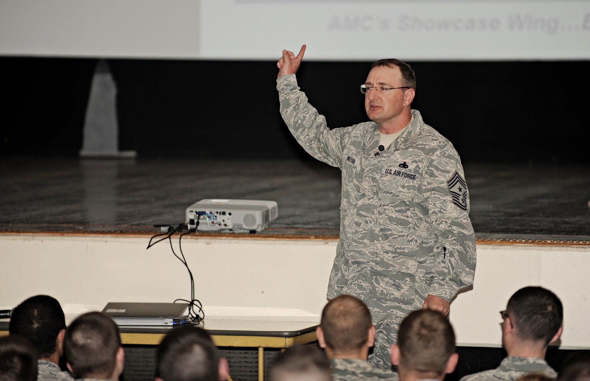 Chief Master Sgt. Marty Anderson, 375th Air Mobility Wing command chief, speaks to enlisted Airmen at the base auditorium April 22 at Scott Air Force Base, Ill. Anderson spoke about the issues in our Air Force today, as well as the importance of staying focused on being excellent Airmen and our mission here at Scott. (U.S. Air Force photo/Airman Kristina Forst)