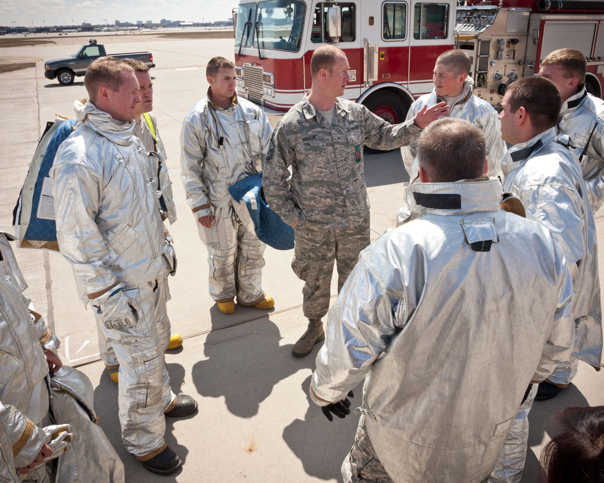 Firefighters from the 934th Civil Engineer Squadron test their skills responding to a simulated C-130 fire during an aircraft emergency exercise at the Minneapolis-St. Paul Air Reserve Station, Minn.  (U.S. Air Force photo/Shannon McKay)