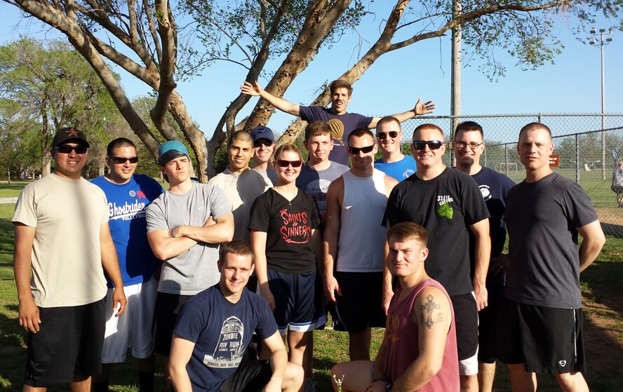 Airmen from the 71st Operations Support Squadron gather for a victory photo after winning the Kick the Silence kickball tournament at Vance Air Force Base, Okla., April 30. (Courtesy Photo 2nd Lt. Daniel Venable) 