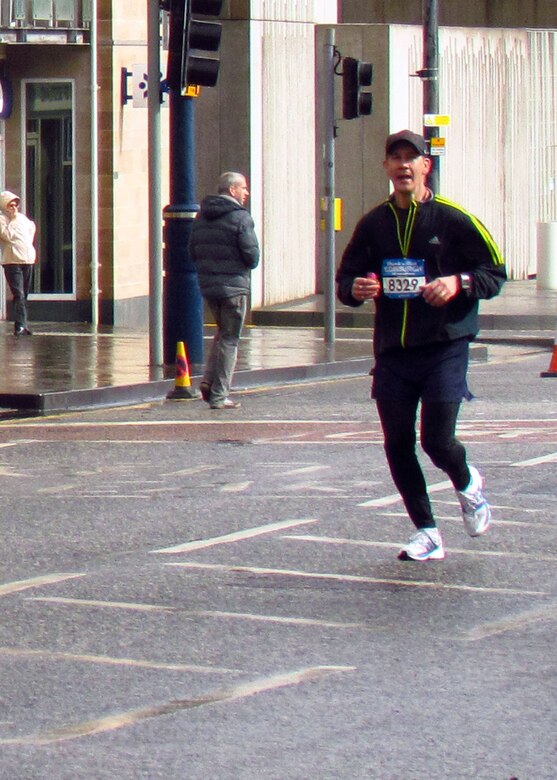 Master Sgt. Brion Rockel, 100th Operations Support Squadron Weather flight chief, runs the 2013 Rock 'n' Roll Half-Marathon in Edinburgh, Scotland. The race course started and finished at Holyrood Park in Edinburgh, Scotland. (Courtesy photo/Released)