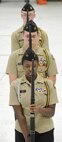 Navy Junior Reserve Officer Training Corps Cadets from Seaford High School, perform their armed drill movements during the 2013 JROTC drill competition,  April, 20, 2013 at Dover Air Force Base, Del. The 436th Logistics Readiness Squadron, 436th Airlift Wing, Dover AFB hosted the event. (U.S. Air Force photo/Greg L. Davis)