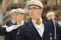 Close-up of Cadet Lt. Col. Chris Palmer, 17, during the 2013 Junior Reserve Officer Training Corps drill competition, April 20, 2013 at Dover Air Force Base, Del. Palmer is from AF JROTC unit 941, Caesar Rodney High School, Camden, Del. The 436th Logistics Readiness Squadron, 436th Airlift Wing, Dover AFB hosted the competition. (U.S. Air Force photo/Greg L. Davis)