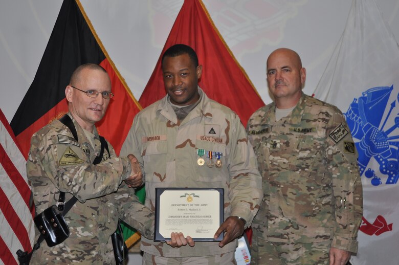 Col. Alfred Pantano Jr., USACE Transatlantic District-North commander (left) and Command Sgt. Maj. Ronald F. Flubacher presented Robert Medlock with a Commander’s Award for Civilian Service during his recent deployment to Afghanistan. 