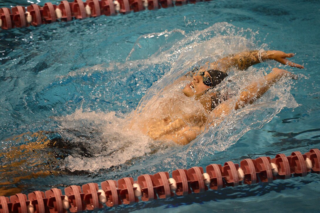 Marine Cpl. Jonathan Ray practices his swimming techniques in Colorado Springs, Colo. He will compete for the Marine team during the 2013 Wounded Warrior Games at the U.S. Olympic Training Center and at the Air Force Academy in Colorado Springs, Colo., May 11-17. Throughout the seven-day event, wounded, ill and injured service members and veterans from the Marines, Army, Air Force, Navy, Coast Guard and Special Operations Command will compete for the gold in track and field, shooting, swimming, cycling, archery, wheelchair basketball and sitting volleyball.  