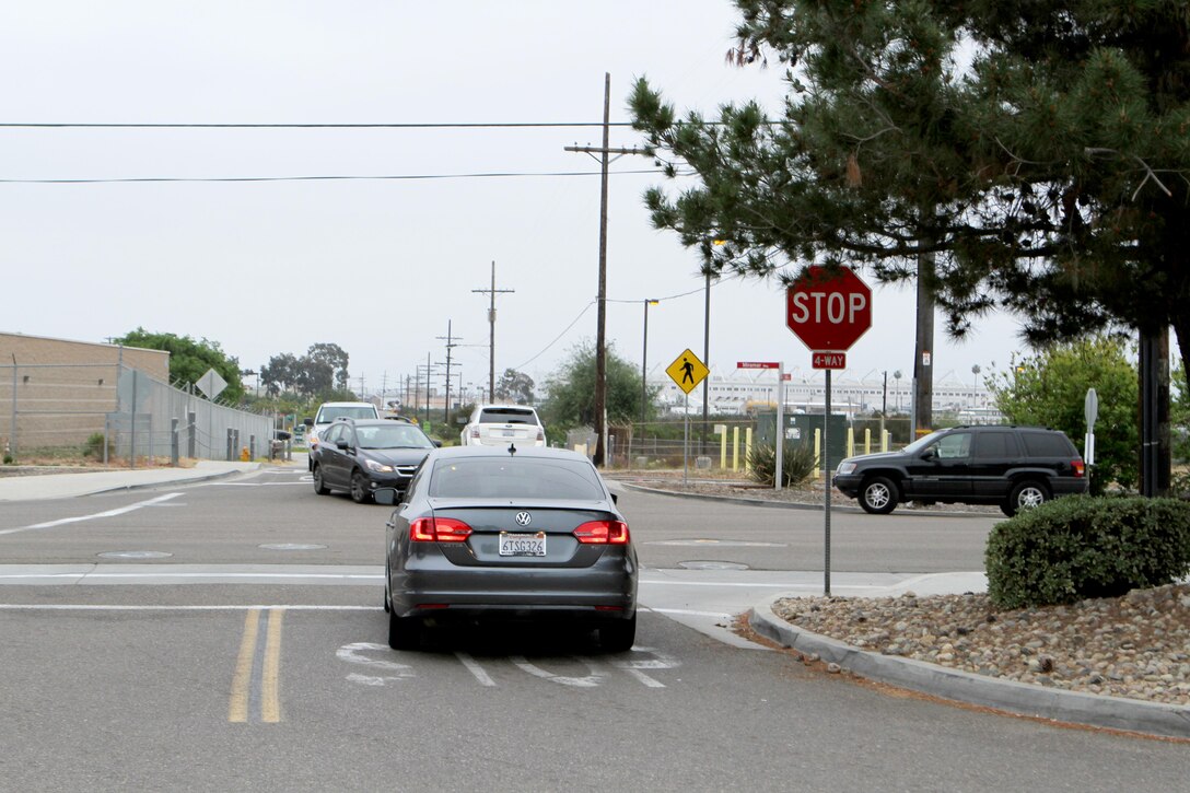 A four-way stop, impeding bushes and a limited lighting during the morning hours make this intersection a dangerous one for users of the new running trail aboard Marine Corps Air Station Miramar, Calif. At Miramar Way and Schilt Avenue, these obstacles make it so that runners need to take extra care when crossing it to ensure they are visible to drivers.