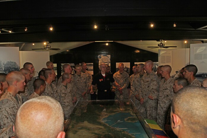 Retired Capt. Joe Larkin, docent, MCRD Museum Historical Society, explains the details of a topographical map of Vietnam to recruits of Company I, 3rd Recruit Training Battalion, in the Command Museum aboard Marine Corps Recruit Depot San Diego April 17. Larkin and fellow docents gave recruits of Co. I a museum tour prior to their Crucible.  