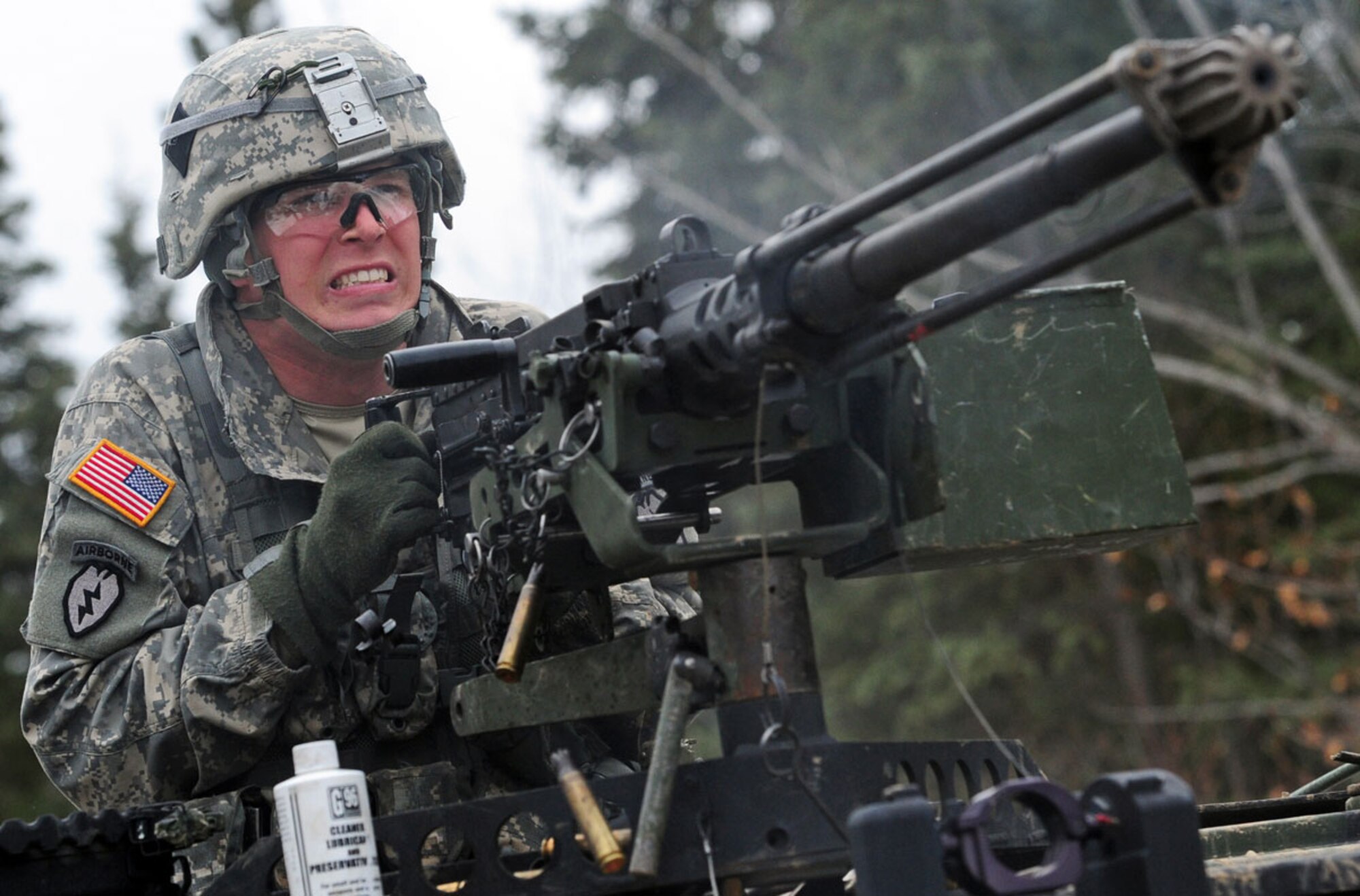 Parachute infantryman Spc. Christopher Bennett, Apache Company, 1st Battalion (Airborne), 501st Infantry Regiment, a native of Skaneatlas, N.Y., fires an M2-HB machine gun as a candidate for the Expert Infantryman Badge on JBER, April 24. The EIB was approved by the Secretary of War October 7, 1943, and is currently awarded to U.S. Army personnel who hold infantry or special forces military occupational specialties. Only 136 out of 672 who tested earned the EIB. (U.S. Air Force photo/Justin Connaher)
