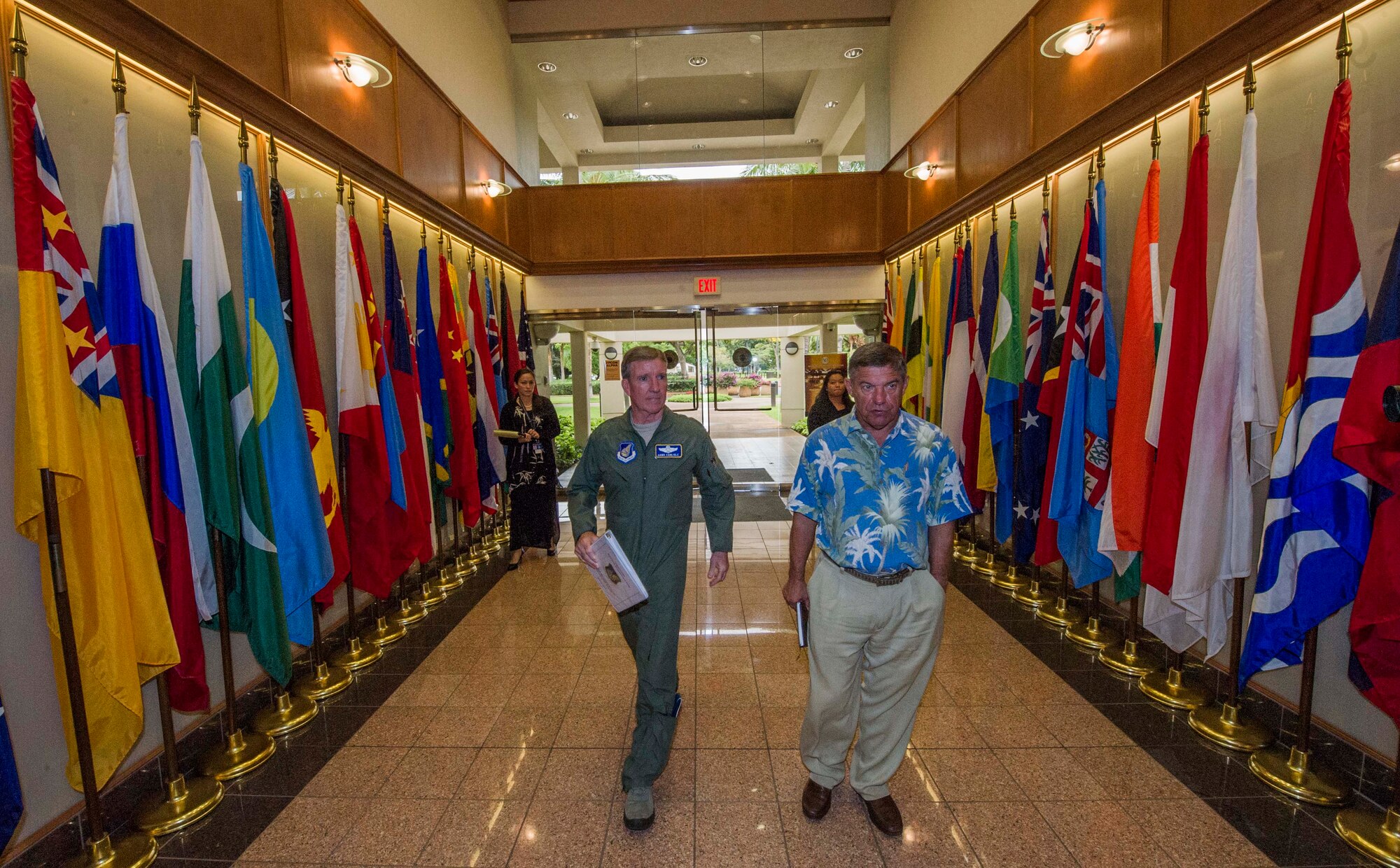Gen. Hawk Carlisle, commander of Pacific Air Forces (left), walks with retired Air Force Lt. Gen. Dan Leaf, Asia-Pacific Center for Security Studies director, after Carlisle's arrival at the APCSS, in Honolulu, Hawaii. The APCSS mission is building capacities and communities of interest by educating, connecting, and empowering security practitioners to advance Asia-Pacific security.  (U.S. Air Force photo by Staff Sgt. Nathan Allen)