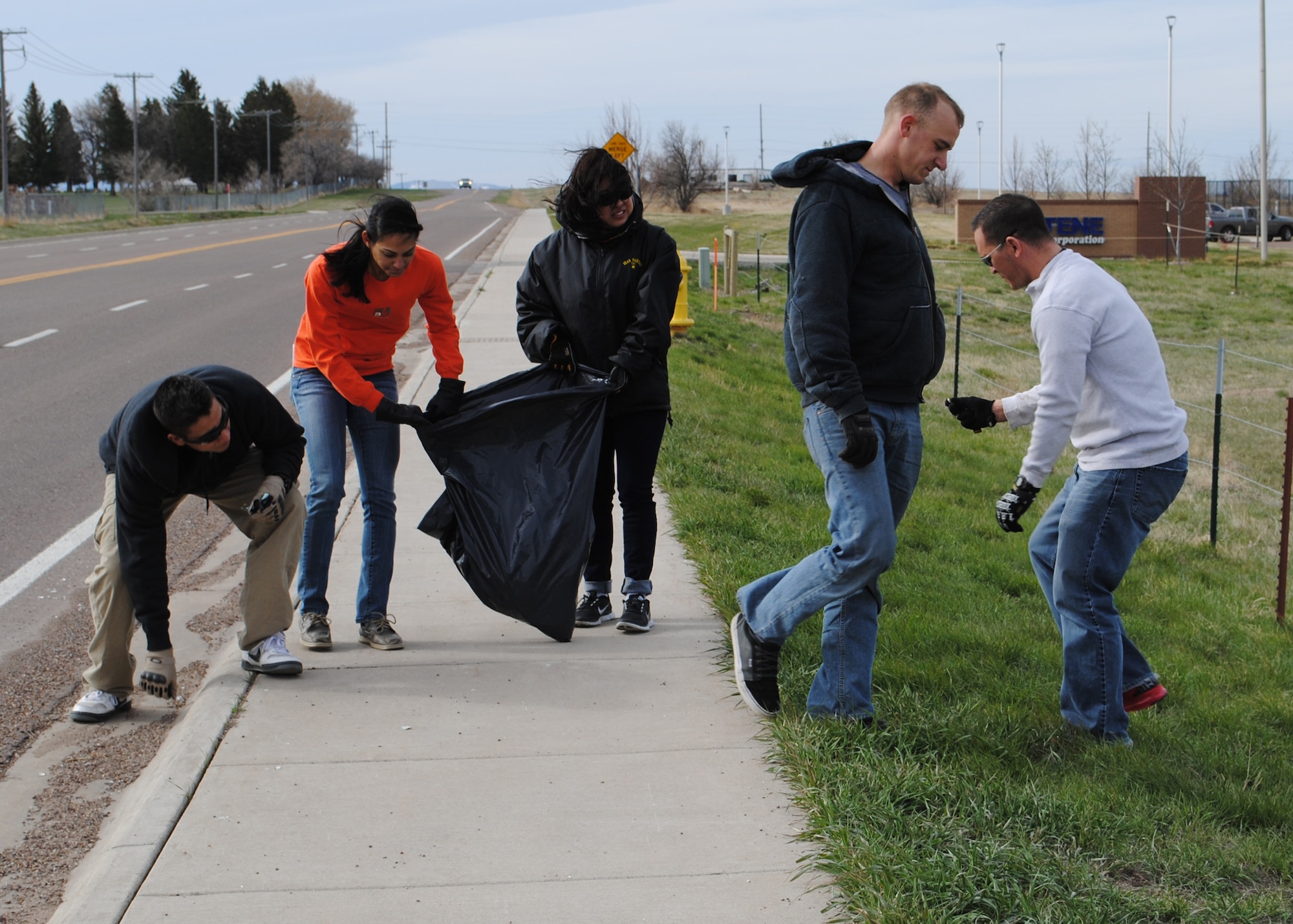 Members of Malmstrom’s 741st Missile Security Forces Squadron walk along a road in Great Falls picking up trash during MApril Cleanup on April 27.  The all-day event will be taking place again on May 18 and volunteers are needed and welcome.  (U.S. Air Force photo/Senior Airman Cortney Paxton)