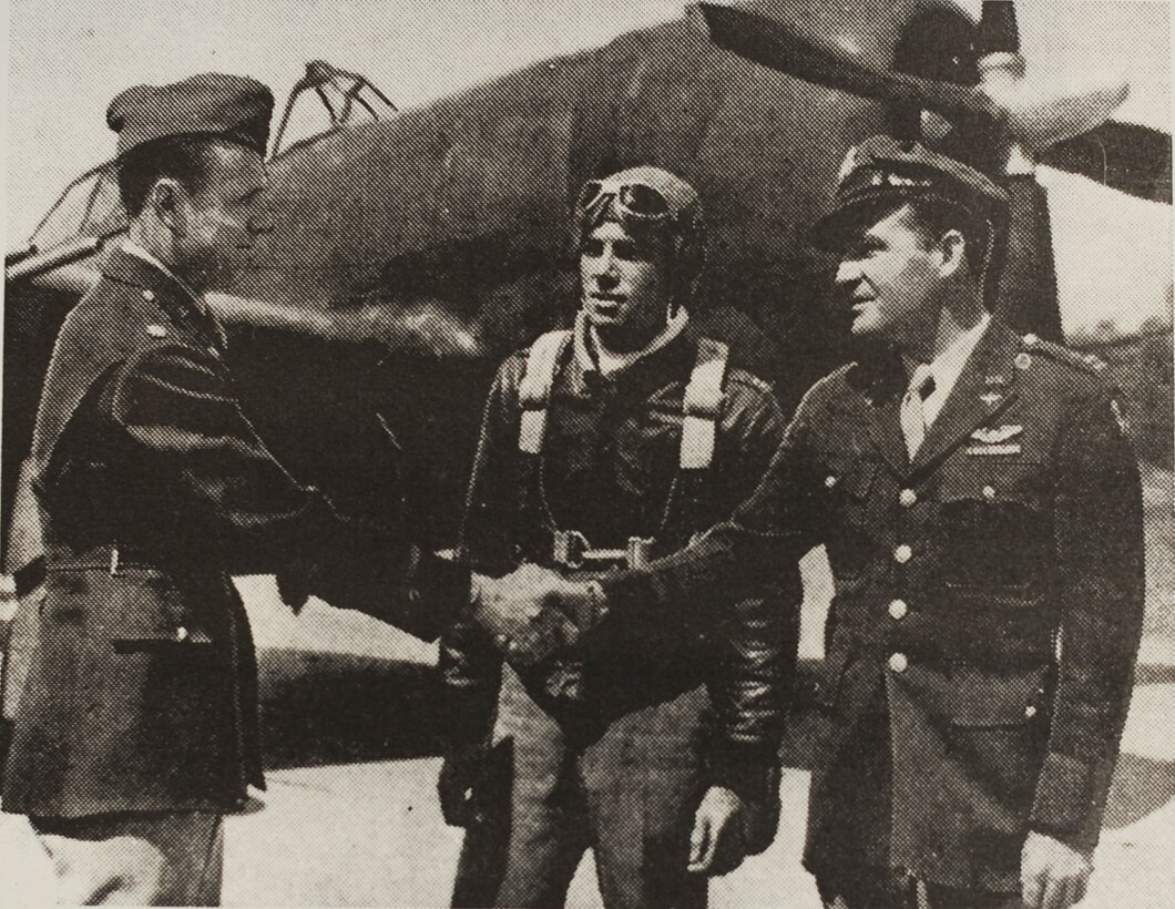 Capt. Andrew W. Salter, Jr., the first commanding officer of what would
become Joint Base Andrews, welcomes the first flying trainees at the
Maryland airfield in May 1943.  The base achieved full operating capability
on May 2, 1943 and became a super-base controlling much of the Eastern
seaboard's military activities less than two months later. (Army Air Force file photo)

