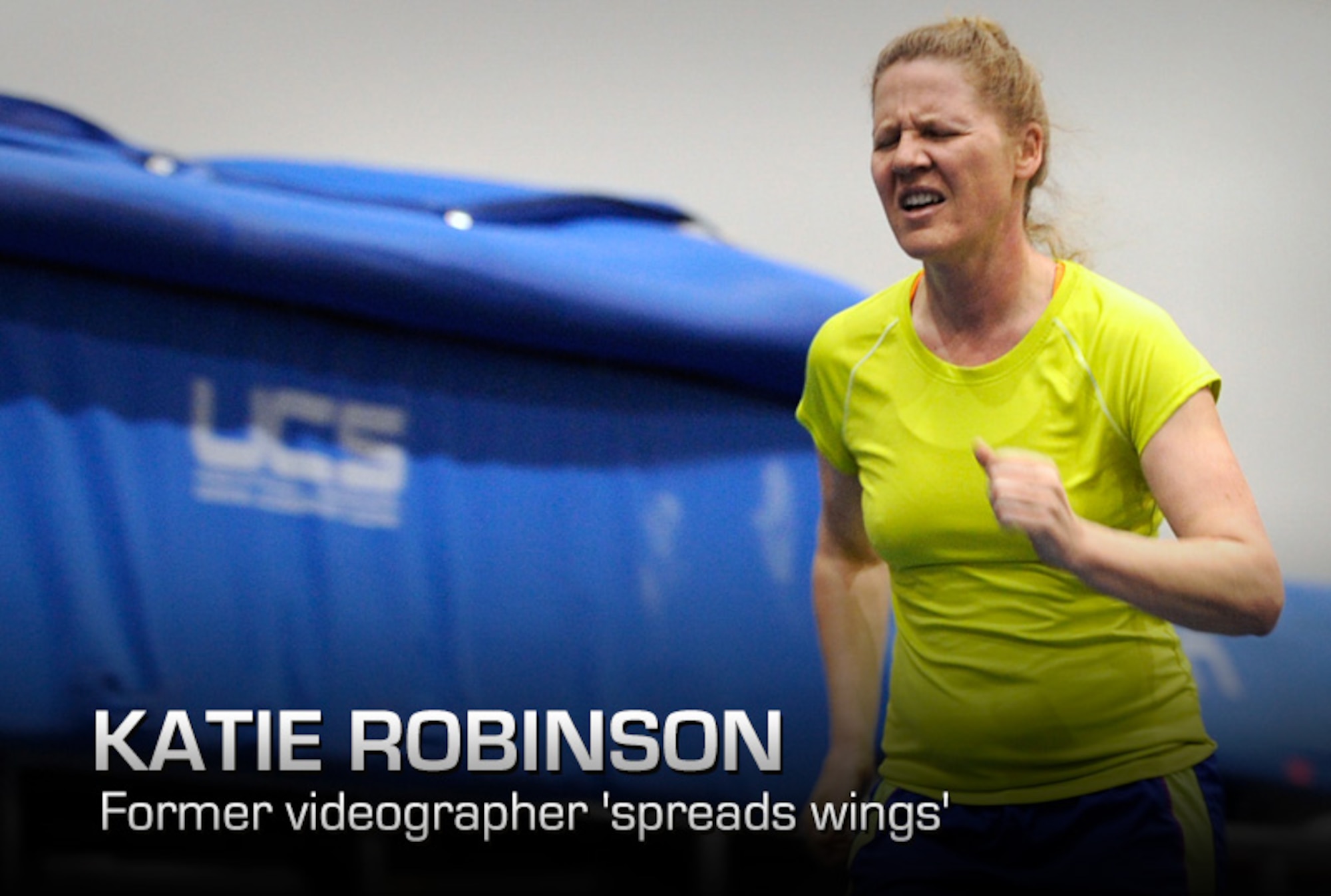 Katie Robinson pushes herself as she runs laps at the Academy Indoor Track during the Wound Warrior Games Training Camp held in Colorado Springs, Colo., April 17, 2013. Robinson resides in Detroit. (U.S. Air Force photo/Desiree Palacios)