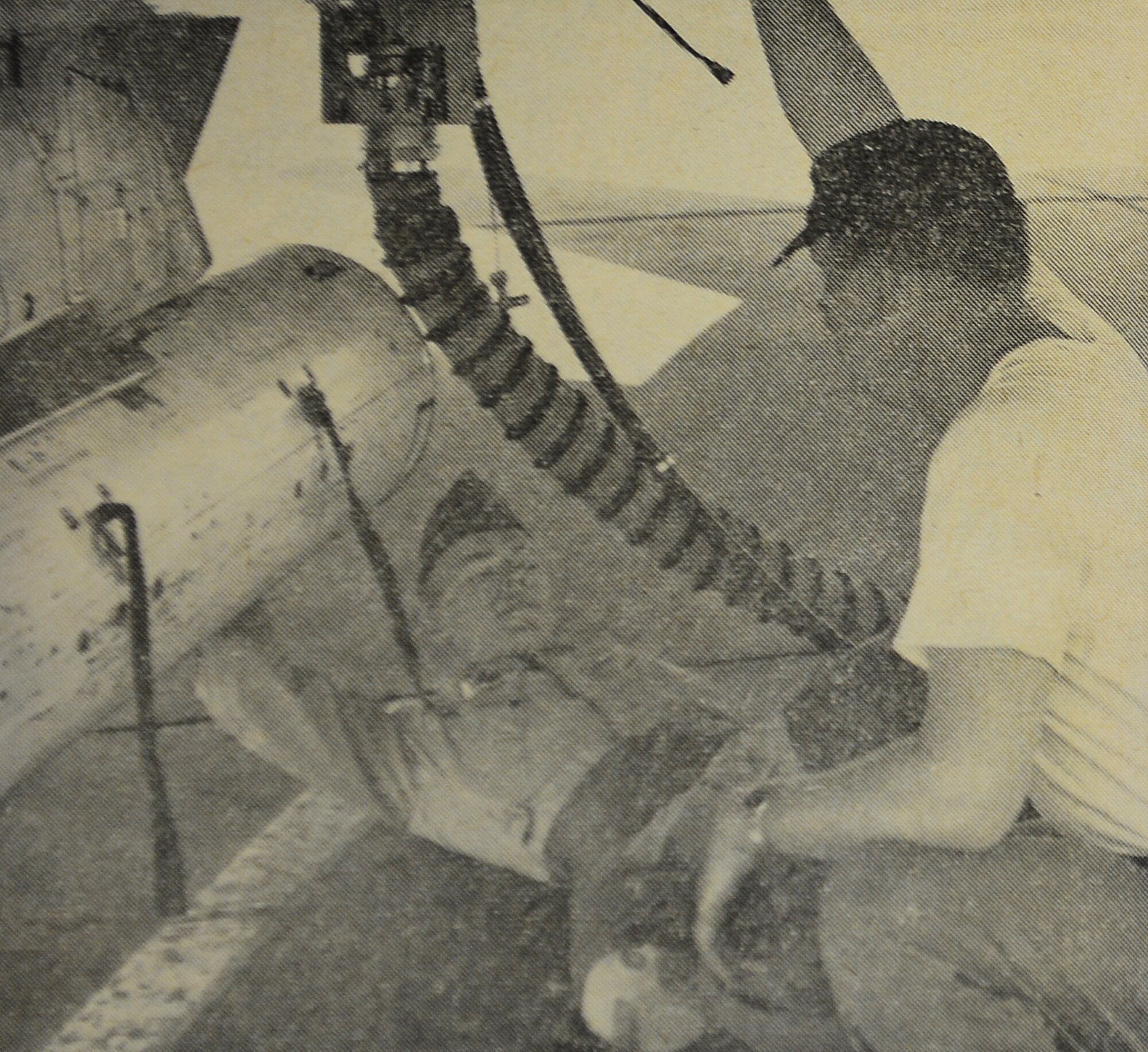 WHEELUS AB, Libya - 1st Lt. John Miko (left) of the 494th Fighter Squadron watches over the bomb loading of an F-100 aircraft with SSgt. Gerald McKinney, a member of the 348th Munitions Maintenance Squadron.