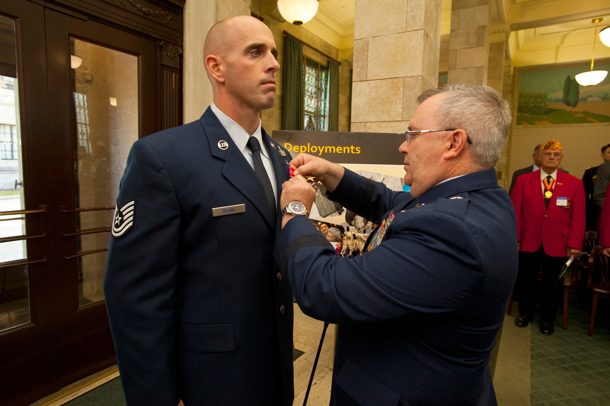 A picture of New Jersey Air National Guard Tech. Sgt. Michael Sears being awarded the Bronze Star by Brig. Gen. Michael L. Cunniff, the adjutant general.