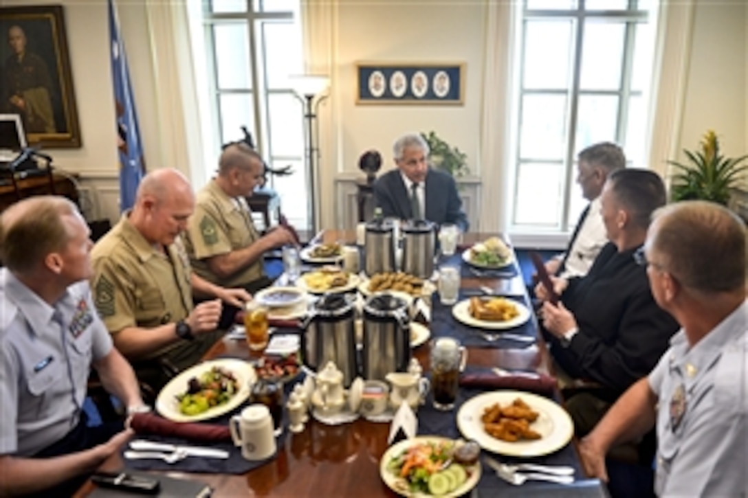 Defense Secretary Chuck Hagel hosts lunch for senior enlisted advisors to the chairman of the Joint Chiefs of Staff during his first meeting with the group at the Pentagon, May 2, 2013.