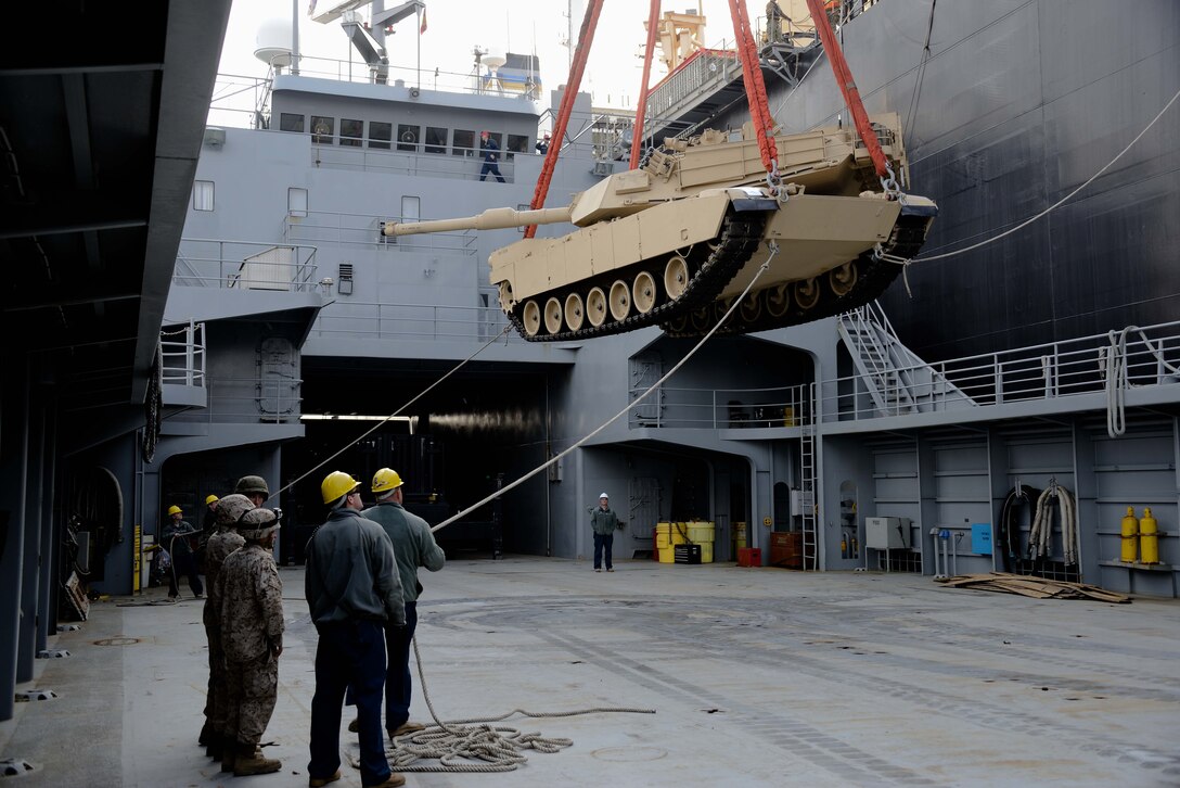 An M1A1 Abrams tank is off-loaded from the USNS 2nd Lt. John P. Bobo April 19 off the shore of Pohang, Republic of Korea. The tank was loaded onto a logistics support vessel for transport to shore. The Bobo, a container and roll on/roll off ship, is part of the U.S. Navy’s Military Sealift Command’s maritime prepositioning force program. The ship is participating in Combined Joint Logistics Over The Shore 2013, a biennial MPF exercise. The ROK Marine Corps and Navy worked with III Marine Expeditionary Force, Army forces with U.S. Forces Korea, Navy Expeditionary Strike Group 3 and U.S. Coast Guard Port Security Unit 313 during the exercise. photos by Cpl. Mark W. Stroud