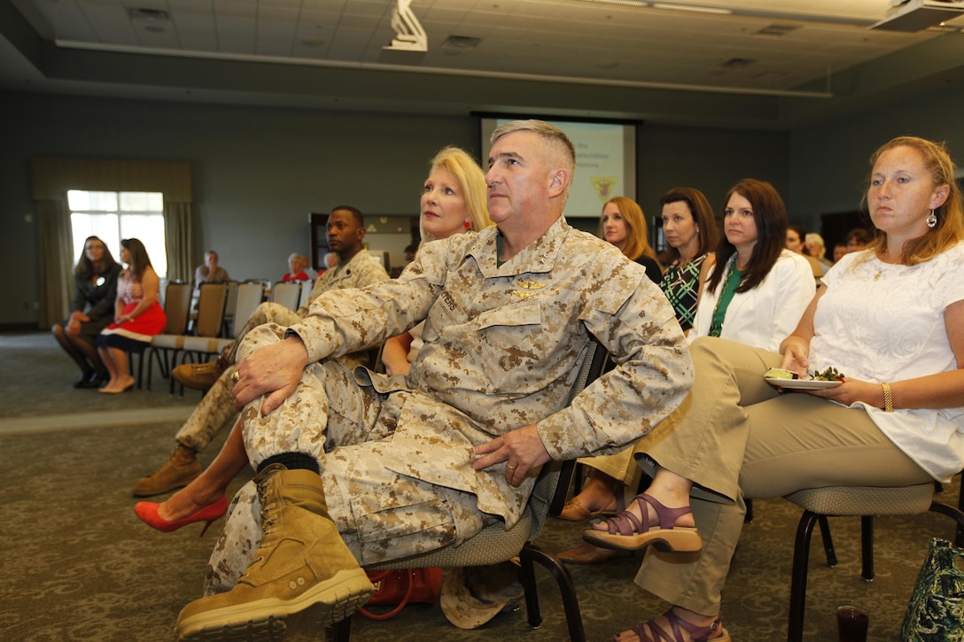 Maj. Gen. Glenn M. Walters, 2nd Marine Aircraft Wing commanding general, watches as 2nd MAW and Cherry Point units and local organizations receive awards during the volunteer appreciation ceremony at Miller’s Landing April 24.

