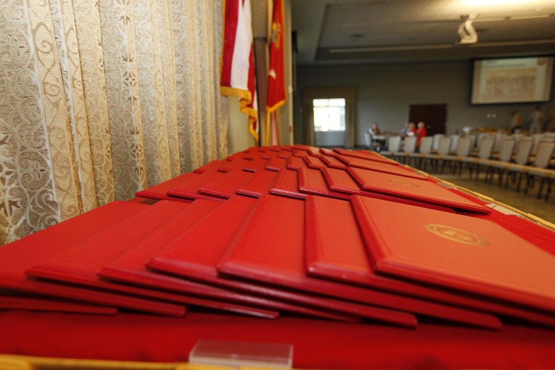 Rows of certificates sit on a table in testament of the number of volunteers who were recognized for their 2012 efforts during the volunteer appreciation ceremony at Miller's Landing Apirl 24. 

