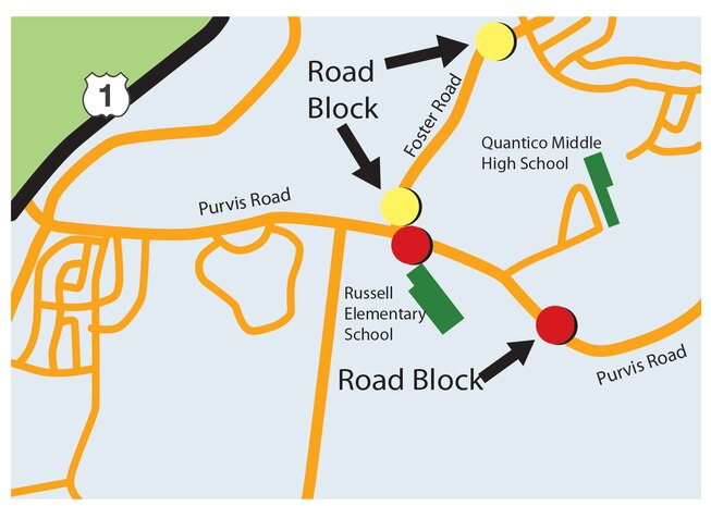 Marine Corps Base Quantico is slated to execute a full scale Force Protection Excercise on May 9, 2013, on and around Purvis Road near Russell Elementary School and Quantico Middle High School. Foster Road, between the yellow dots pictured, will close at 8:30 a.m., that day for staging emergency vehicles for the Force Protection Exercise. Purvis Road, between the red dots, will close once all the students have left school grounds.