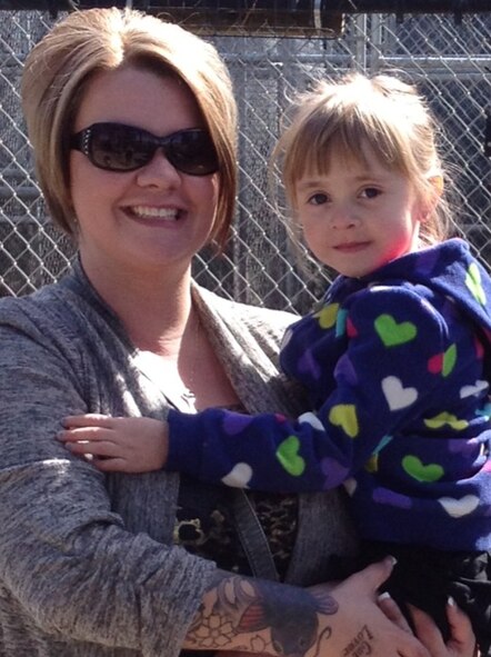 (Retired) Sgt. Jolene Raciborski and her daughter Abbigail take a photo at Cat Tales Zoo near Spokane, Wash., May 2, 2013. (Courtesy Photo)