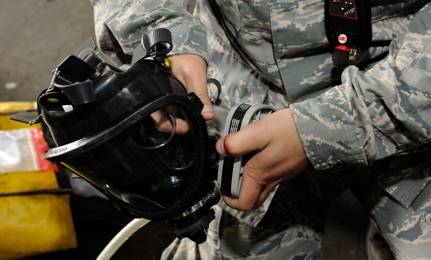 Senior Airman Michael Mazolla, 2nd Maintenance Squadron Accessories Flight Fuels Maintenance, attaches filters to a respirator on Barksdale Air Force Base, La., May 3, 2013. Airmen in the fuels section have the responsibility of diagnosing and repairing the various fuel systems and fuel tanks on the B-52H Stratofortress to ensure the aircraft completes its mission of delivering precision munitions on the battlefield. (U.S. Air Force photo/Airman 1st Class Andrew Moua)