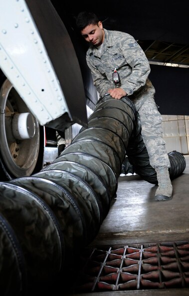 Senior Airman Michael Mazzola, 2nd Maintenance Squadron Accessories Flight Fuels Maintenance, assembles an air duct during maintenance of a B-52H Stratofortress on Barksdale Air Force Base, La., May 3, 2013. Fuels Airmen have the responsibility of diagnosing and repairing the various fuel systems and fuel tanks on the B-52 to ensure the aircraft completes its mission of delivering precision munitions on the battlefield. (U.S. Air Force photo/Airman 1st Class Andrew Moua)