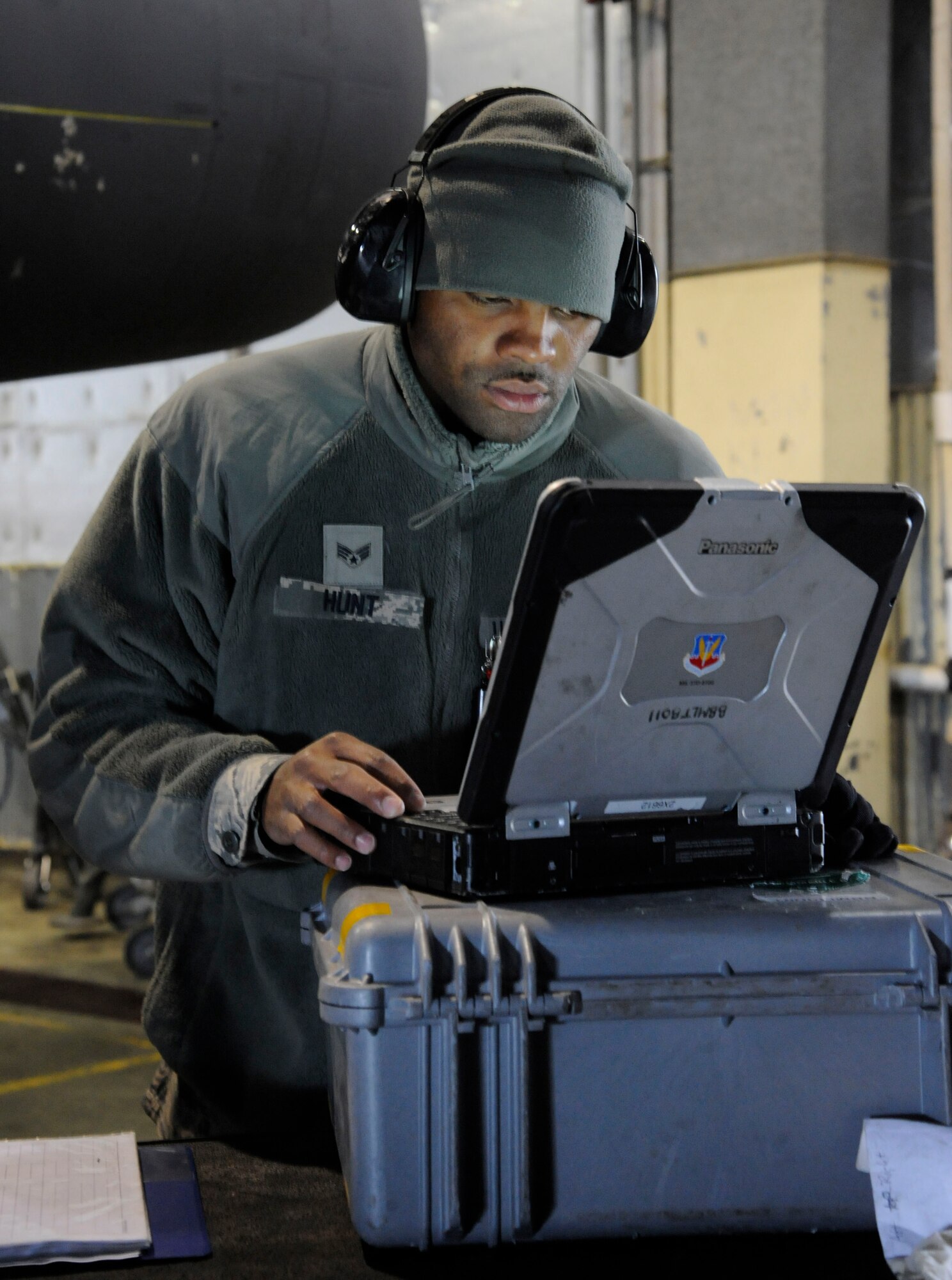 Senior Airman John Hunt, 2nd Maintenance Squadron Accessories Flight Fuels Maintenance, looks over a technical order during maintenance of a B-52H Stratofortress on Barksdale Air Force Base, La., May 3, 2013. TOs are step-by-step instruction manuals used by maintenance Airmen that list proper tools needed, any hazards to be aware of and protective gear to accomplish the task. (U.S. Air Force photo/Airman 1st Class Andrew Moua)